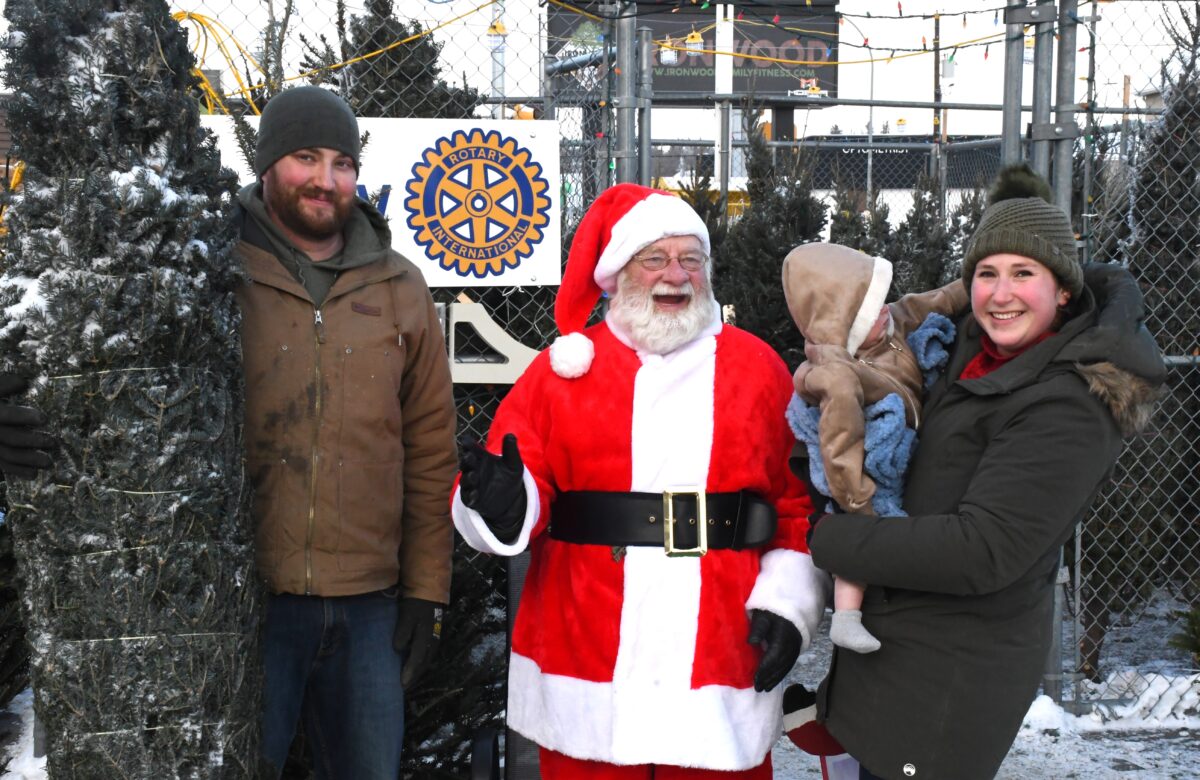 Santa makes a special visit to help families pick a tree with the Rotary Club